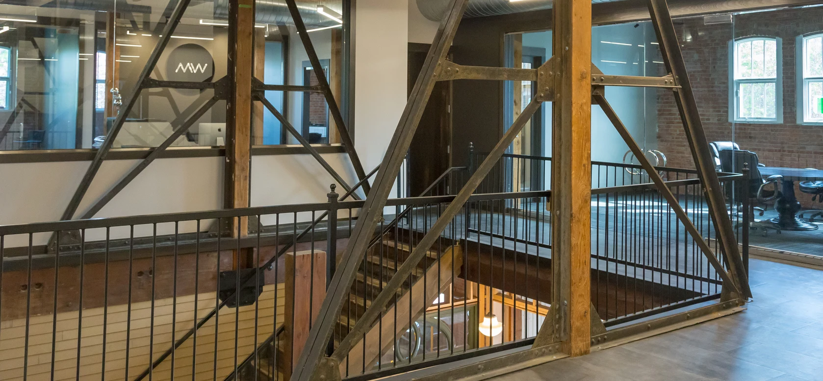 Exposed steel and timber inside 2223 Montana Avenue